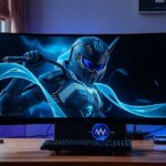 Modern gaming monitor with a futuristic character display